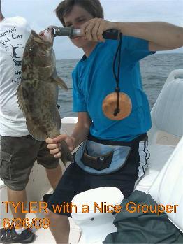 Tampa Bay charter fishing catching grouper