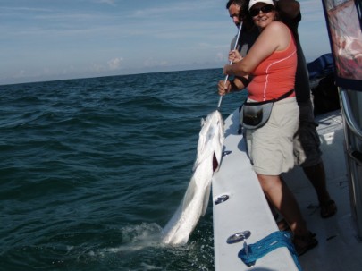 Woman catch tarpon too.
